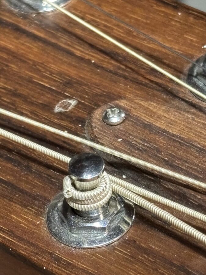 Dent in Taylor headstock Repair And Restoration